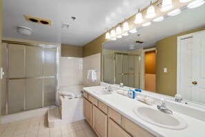 Shower, hair dryer, towels, shampoo