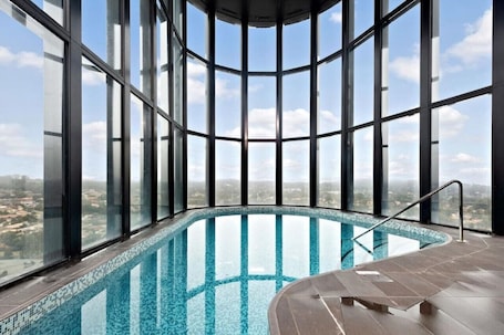 Pool. Luxurious Apt with Serene Lake Views