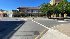 A street view with a building labeled "Premier Pianos" on the left. - Brilliant Apt by Rottnest Ferry and Fremantle Oval (Fremantle)
