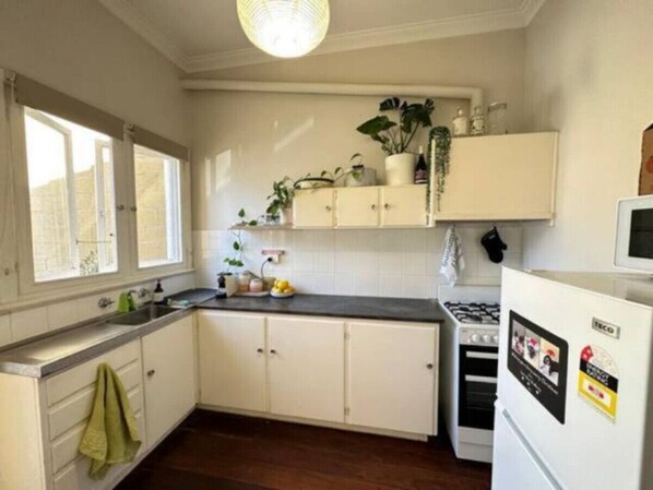 Fridge, microwave, toaster, cookware/dishes/utensils