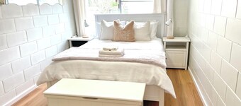 Family Beach Stay with Ocean Glimpses 2 mins walk to beach