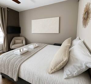 Iron/ironing board, travel crib, WiFi, bed sheets