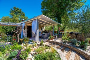 Outdoor dining - Beautiful holiday home with a private pool near Pula. (Kacana)