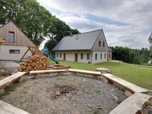 Explore the great outdoors in a peaceful natural setting, complete with a play structure and seating area.