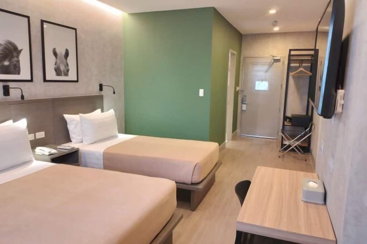 In-room safe, desk, blackout curtains, iron/ironing board (on request)