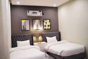 ห้องดีลักซ์ | 1 ห้องนอน, เครื่องนอนระดับพรีเมียม, มินิบาร์, Wi-Fi ฟรี
