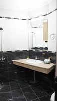 Shower, free toiletries, hair dryer, slippers