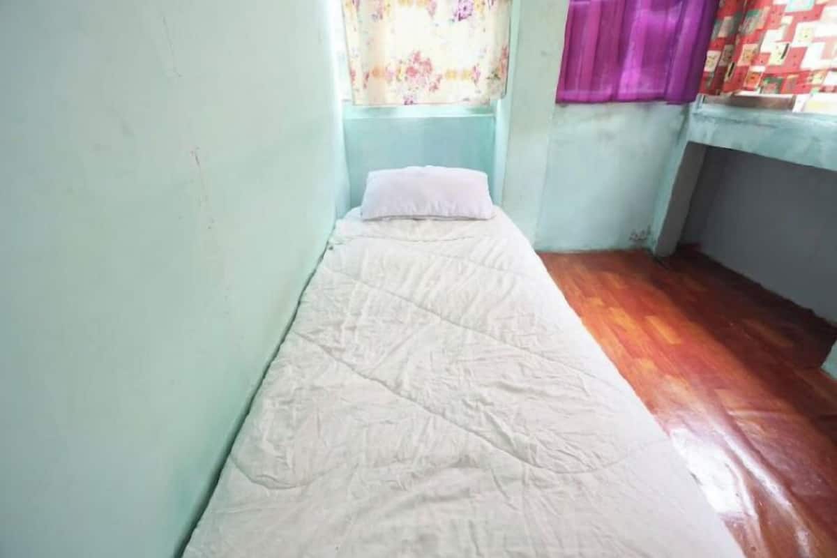Habitación individual básica | Ropa de cama