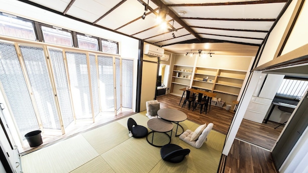 A compact living space with a kitchen, dining area, and seating area. - Enyu No Yado Dogo (Matsuyama)