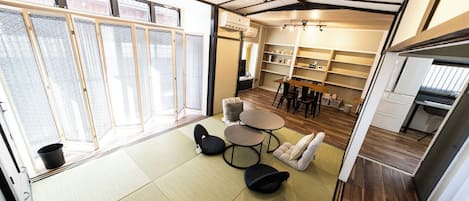 Comfort House | Living area | 50-inch flat-screen TV with digital channels
