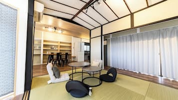 Comfort House | Living area | 50-inch flat-screen TV with digital channels
