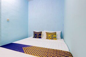 Basic Double Room | Bed sheets - Hotel O Gioba Kost Syariah (Wirosari)