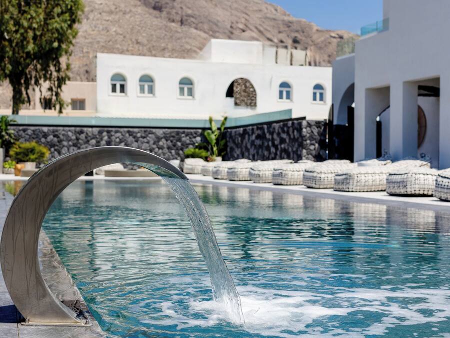 Seasonal outdoor pool, open 9:00 AM to 8:00 PM, pool umbrellas