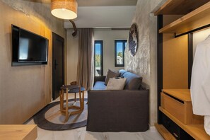 Premium Junior Suite Split Level | Living room | 42-inch Smart TV with satellite channels, Netflix, streaming services - Santo Mangata Boutique Hotel & Spa - Adults Only (Santorini)