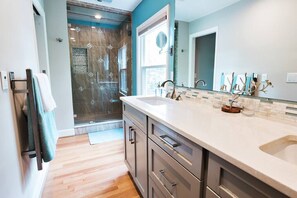 Shower, hair dryer, towels