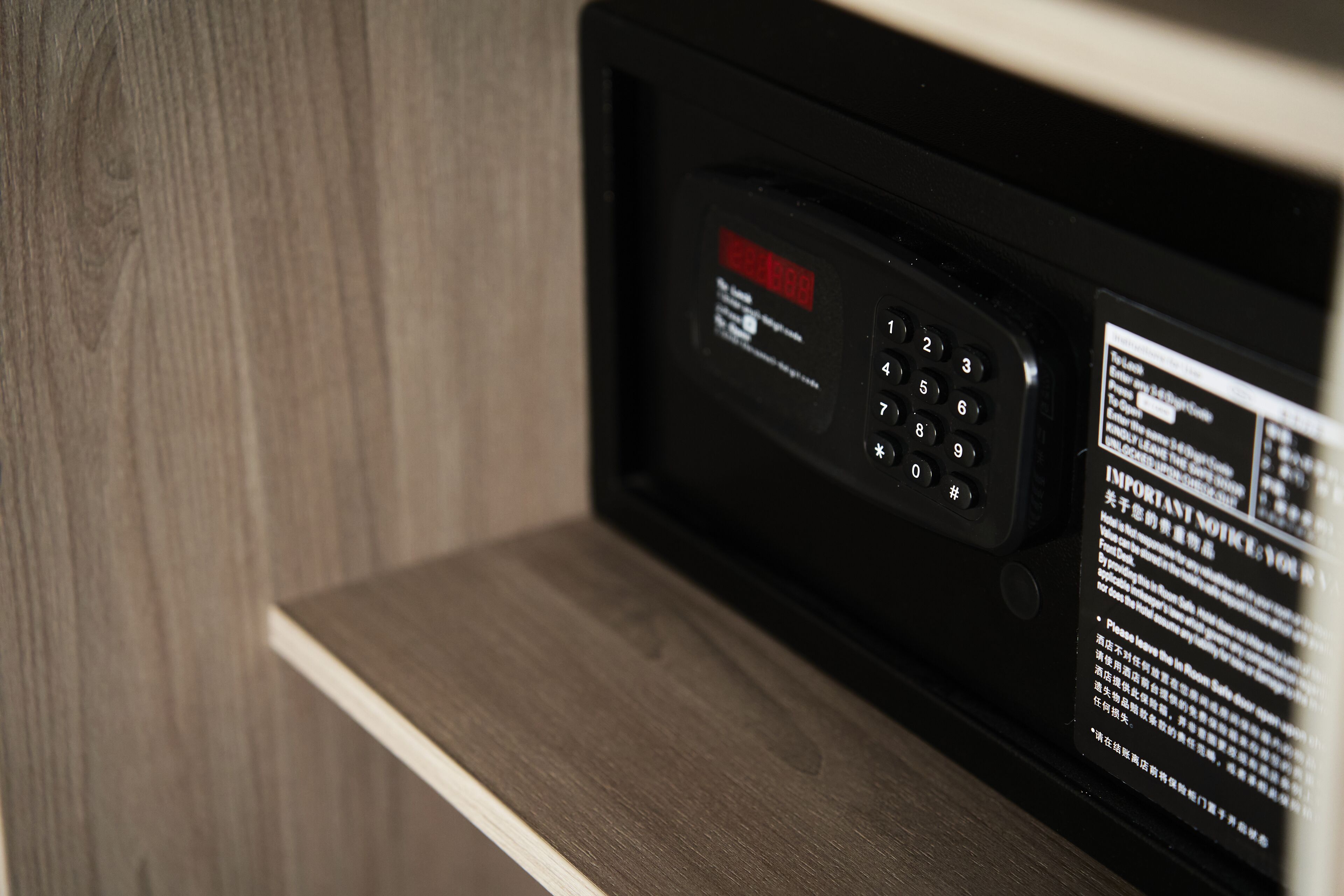 A control panel with a digital display and a keypad, likely for a microwave or similar appliance.