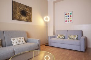 Family Apartment (Piazzale Cantore 3) | 거실 공간 | 평면 TV