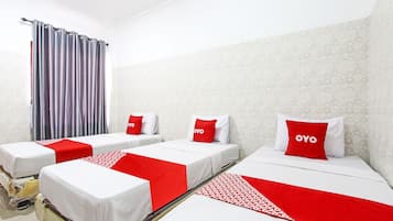 Suite económica | 1 habitación, wifi gratis y ropa de cama