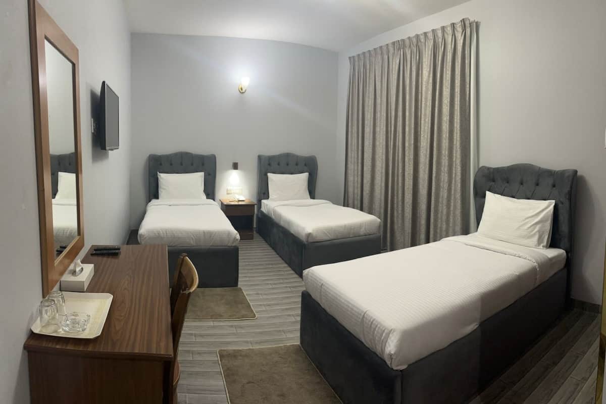 Laptop workspace, free WiFi, bed sheets