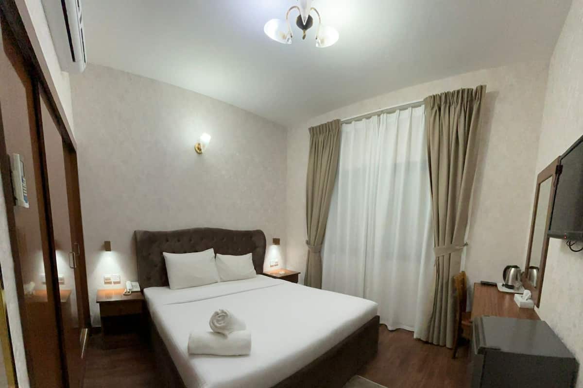 Laptop workspace, free WiFi, bed sheets