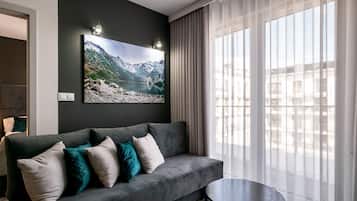 Classic Apartment | Living area | 37-inch flat-screen TV with cable channels, streaming services