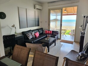 Standard House | Living area | Flat-screen TV - Mattis Seafront Beachhouse (Pervolia)