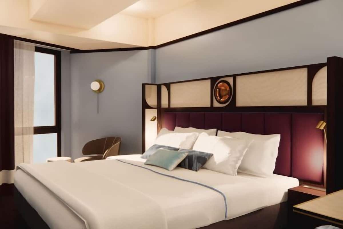 1 Schlafzimmer, hochwertige Bettwaren, Daunenbettdecken, Minibar