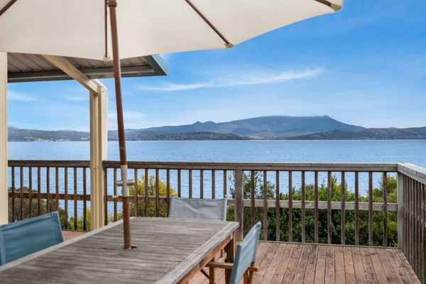 Deck with a View: Savor breathtaking panoramas while dining al fresco on the spacious deck!