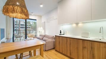 Apartment | Private kitchenette | Fridge, stovetop, cookware/dishes/utensils