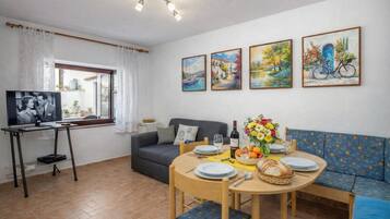 21-inch flat-screen TV with satellite channels