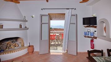 House | Living area | 28-inch flat-screen TV with digital channels, fireplace
