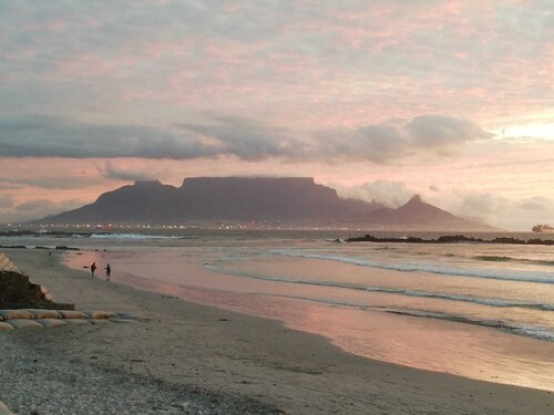 On the beach cabana at Bloubergstrand! Sea view of Robben Island and Cape Town.