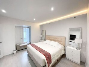 1 dormitorio, tabla de planchar con plancha, wifi gratis y ropa de cama