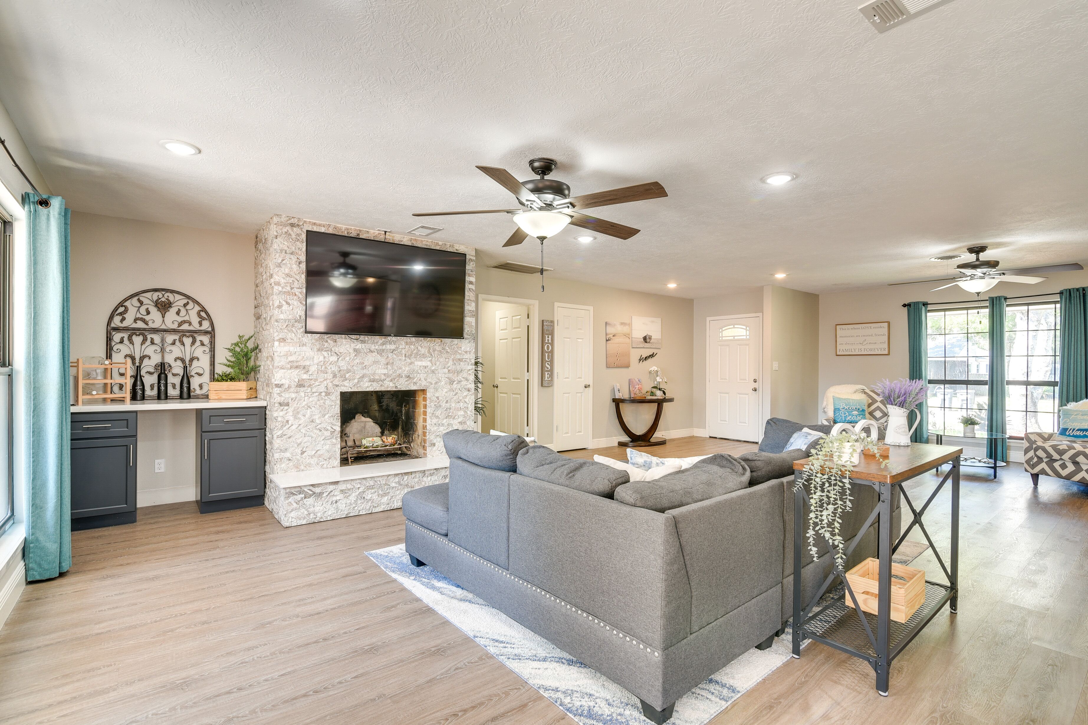 TV, fireplace, books