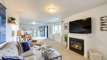 House (1 Bedroom) | Living area | TV, fireplace