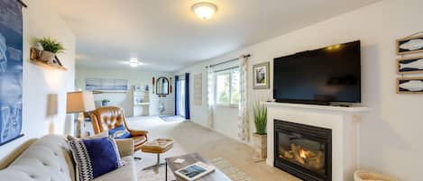 House (1 Bedroom) | Living area | TV, fireplace