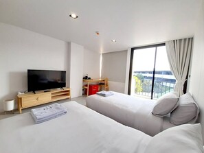 Chambre Supérieure avec lits jumeaux | Literie hypoallergénique, bureau, rideaux occultants, Wi-Fi gratuit