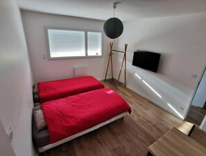 2 habitaciones y ropa de cama