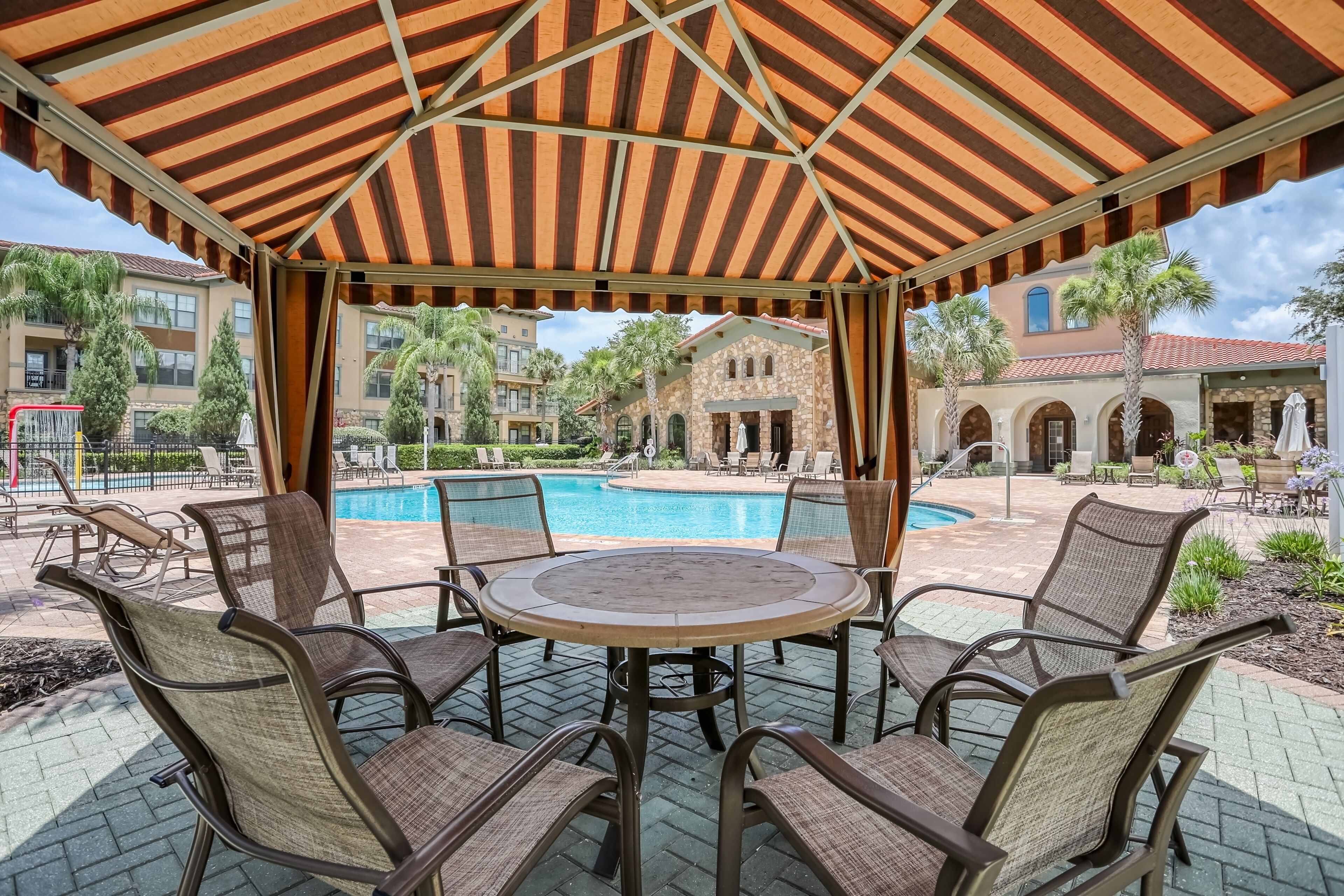 Serene condo with a balcony & a washer/dryer plus pools, gym, & game room