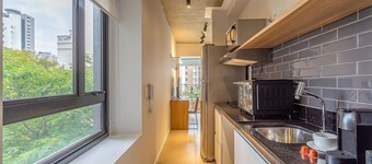 Next Home Design by Viva - Apartamentos em prédio próximo ao Parque do Ibirapuera