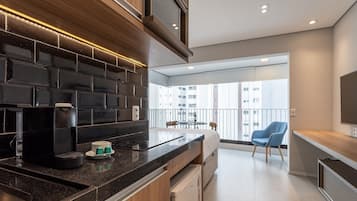 Monolocale Basic | Cucina privata | Microonde, piano cottura, macchina per caffè espresso