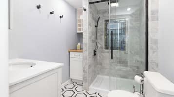 Condo, 1 Double Bed, Kitchen, Garden View (The Opening Act) | Bathroom | Shower, towels
