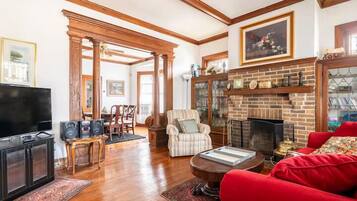 Family House | Living area | 50-inch Smart TV with digital channels, Netflix, DVD player