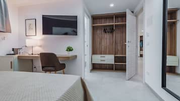 Deluxe Room | Individually furnished, desk, laptop workspace, blackout curtains