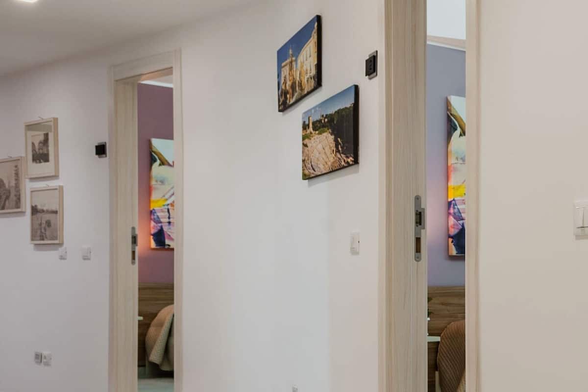 Deluxe Room | Individually furnished, desk, laptop workspace, blackout curtains