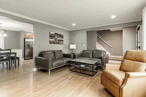 TV, fireplace, books, offices