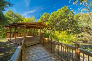 Terrace/patio - Utopia River Retreat is a secluded paradise nestled along the Sabinal River in the Texas Hill Country. (Utopia)