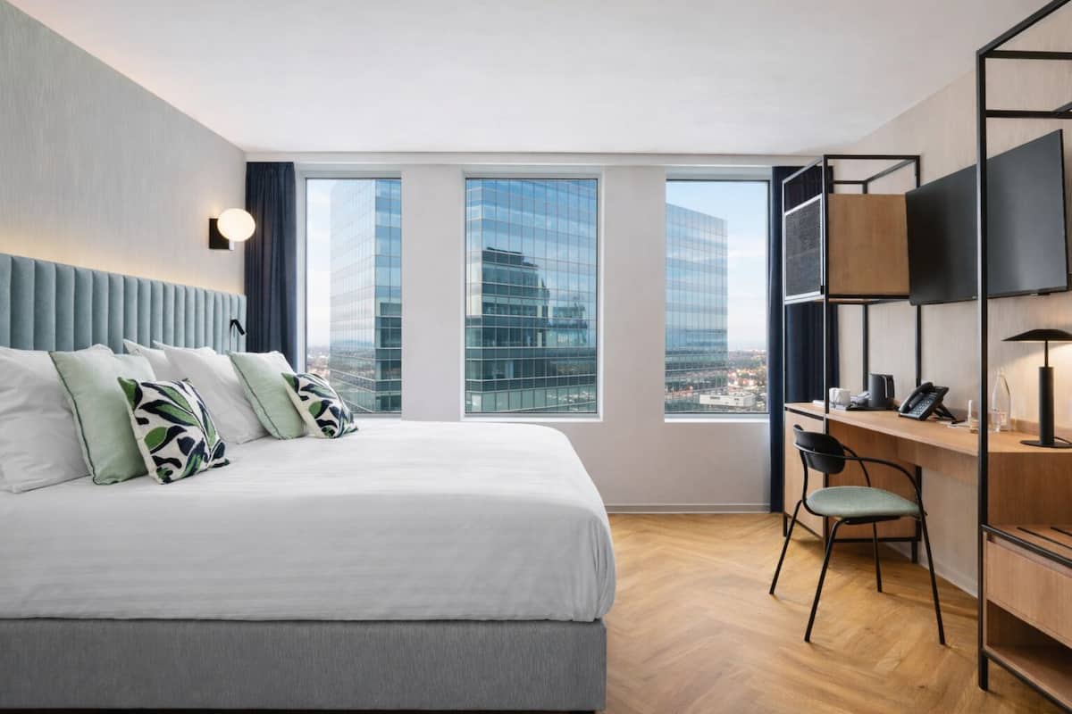 Desk, blackout drapes, soundproofing, free cribs/infant beds