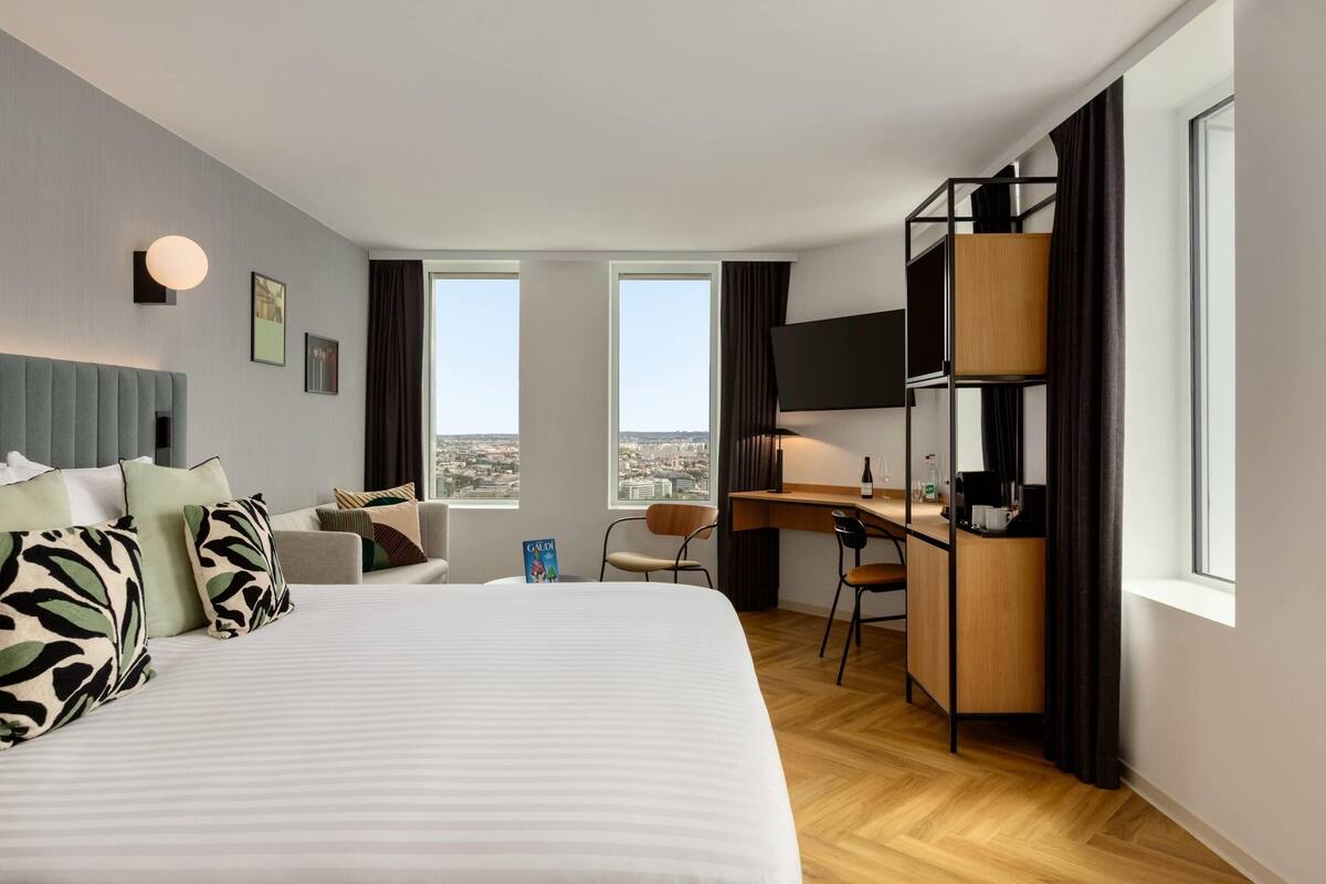 Junior Suite (Eiffel Tower View) | Desk, laptop workspace, blackout drapes, soundproofing