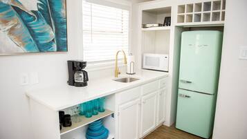 Fridge, microwave, cookware/dishes/utensils
